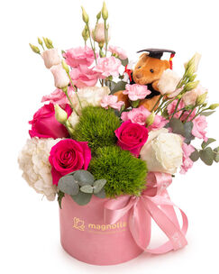 Graduation floral arrangement with roses and accessories
