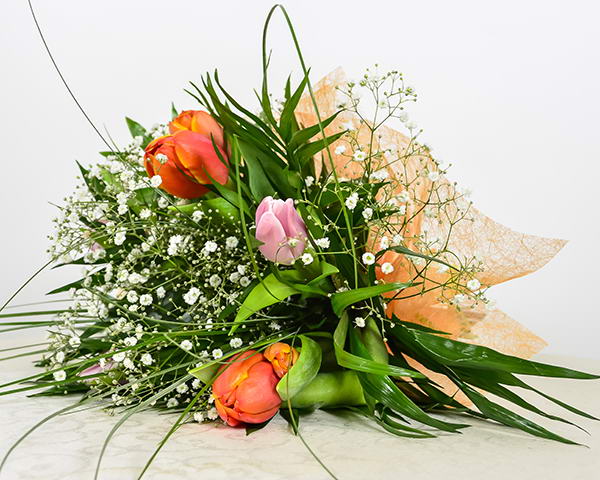Tulips bouquet with gypsophilla, chico and beargrass