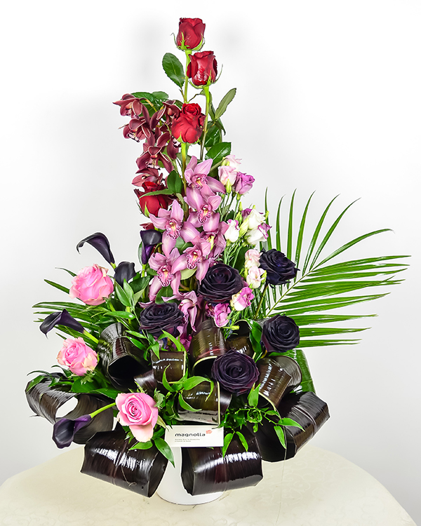 Orchid and rose arrangement