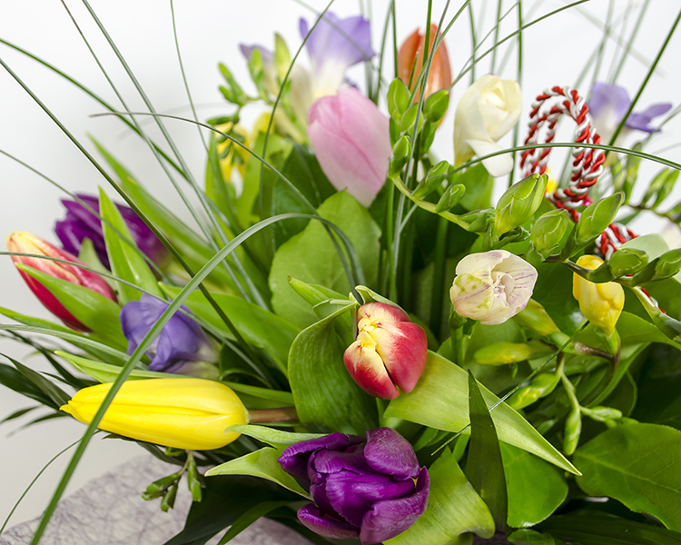 Bouquet with freesias, tulips and a Martisor String