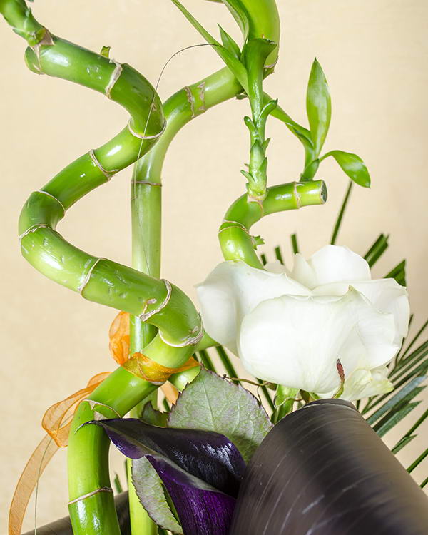 Bouquet with gerbera, roses and bamboo