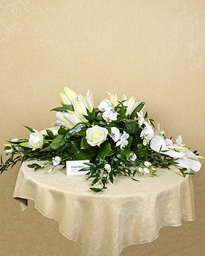 Funeral arrangement with white flowers