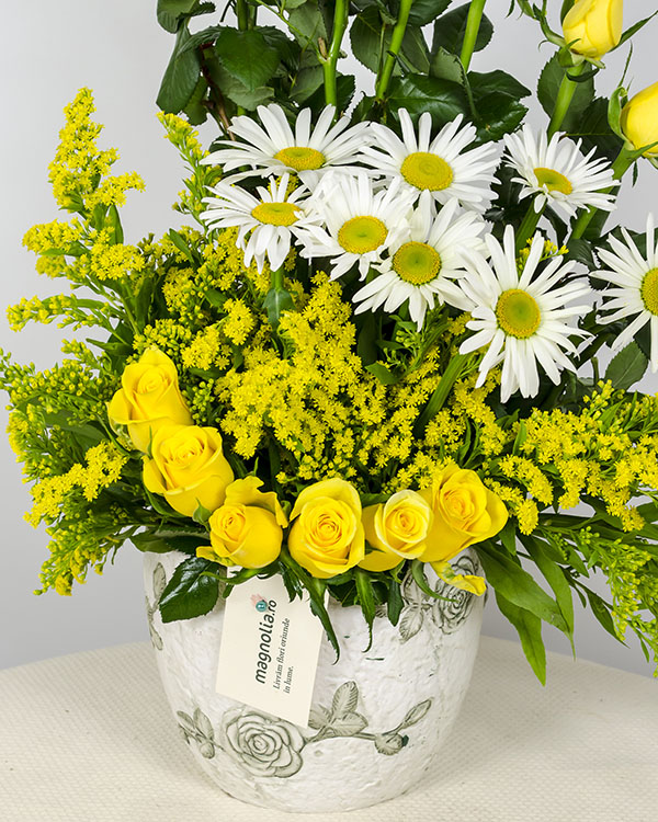 Yellow roses, Soligado and white flowers arrangement