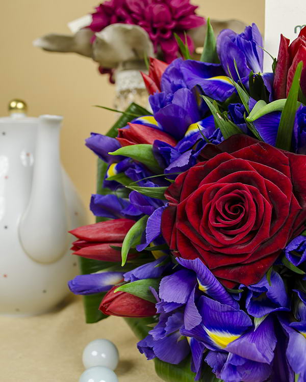 Bouquet with irises, tulips and one Grand Prix red rose