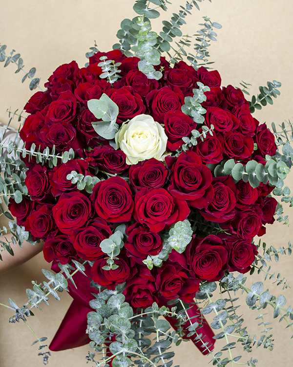 60 red roses and 1 white rose bouquet
