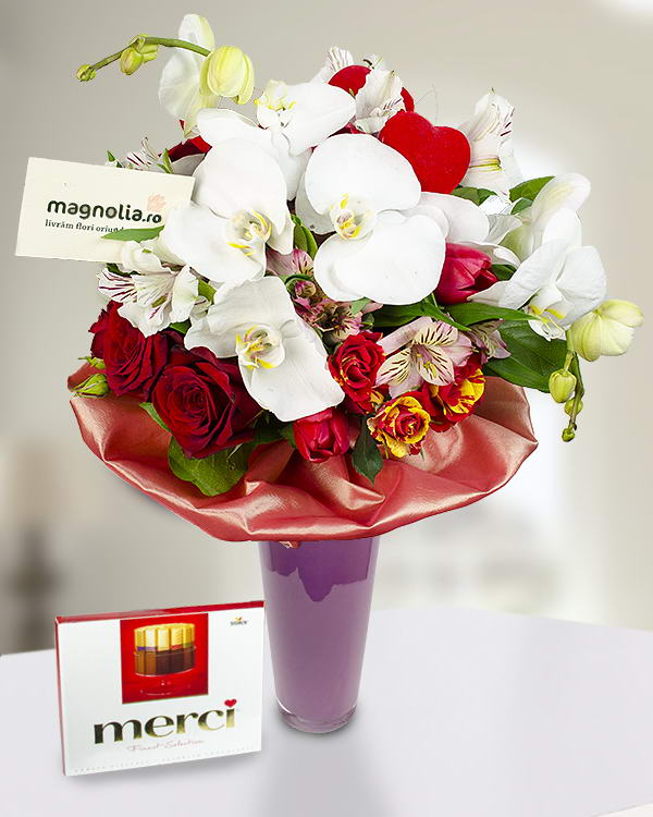 Bouquet of roses, orchids and chocolate