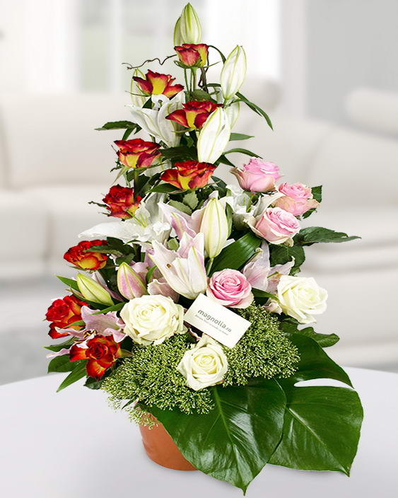 Arrangement with lilies and roses