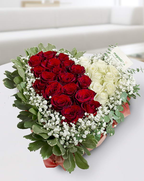Heart-shaped arrangement with 29 roses