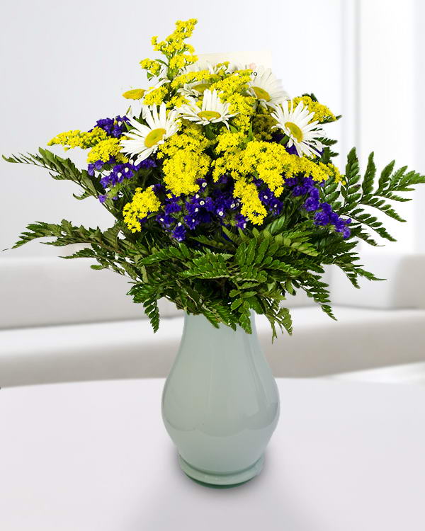 Bouquet with solidago, limonium and white flowers