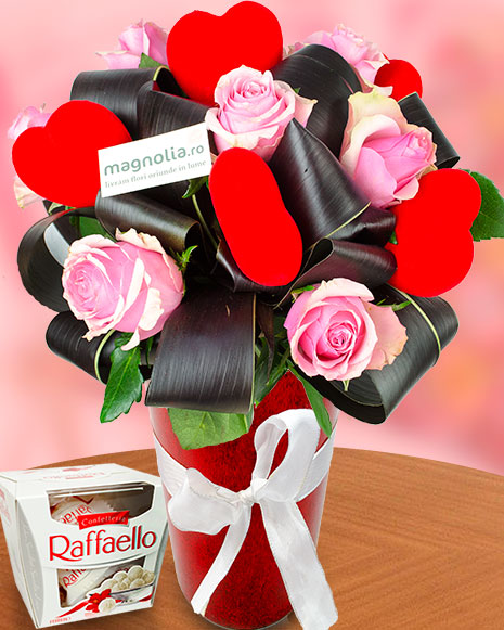 Bouquet of pink roses with hearts and chocolate