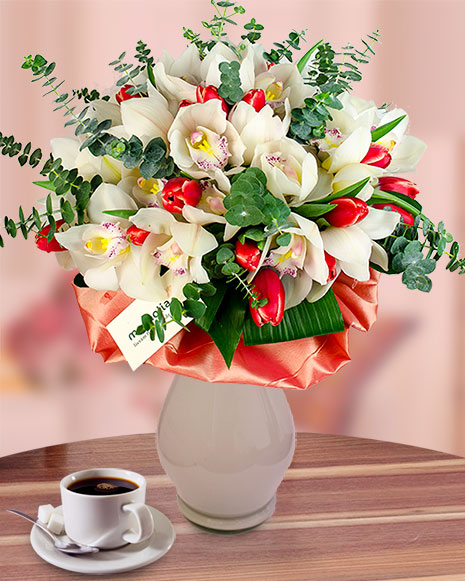 Bouquet of cymbidium orchids and tulips