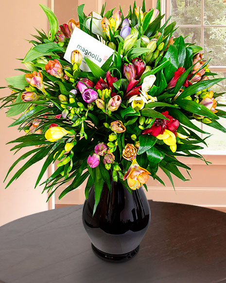 Bouquet with alstroemeria, freesias and chico