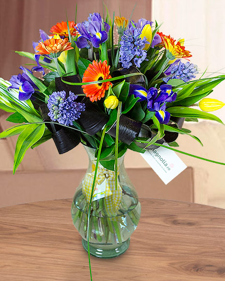 Bouquet of tulips irises hyacinthus and gerbera