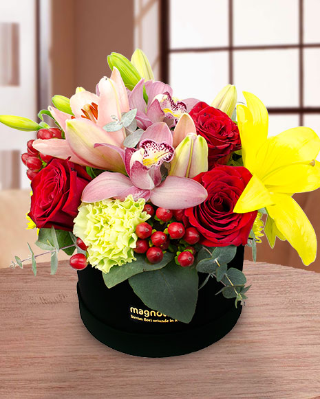 Box arrangement of roses and cymbidium