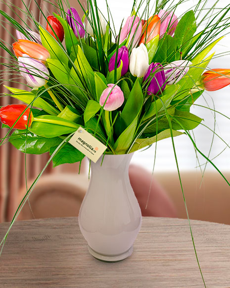 Bouquet with 21 tulips, beargrass and salal