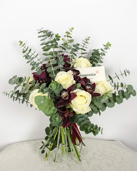Bouquet with Avalanche roses and Cymbidium orchid
