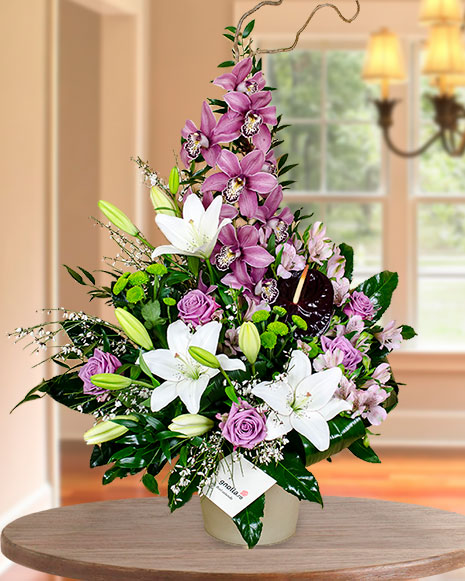 Orchid, lilies, roses, chrysanthemums, alstroemeria arrangement