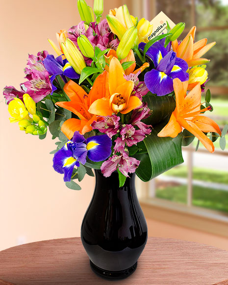 Bouquet with freesias, lilies and irises
