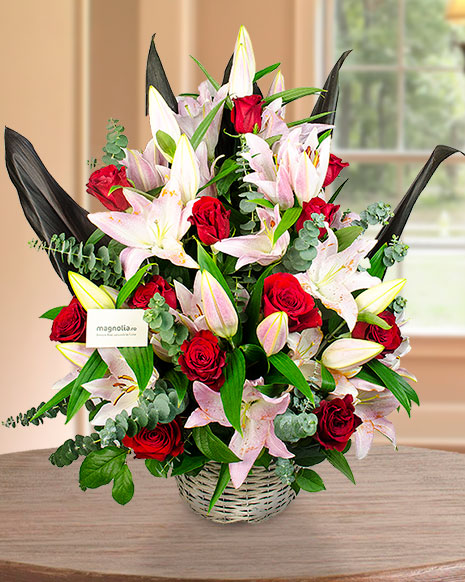 Arrangement with imperial lilies and red roses