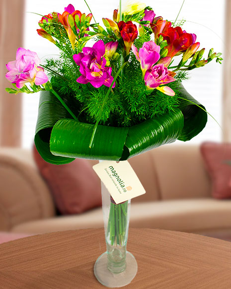 Fresh bouquet with freesias and aspidistra