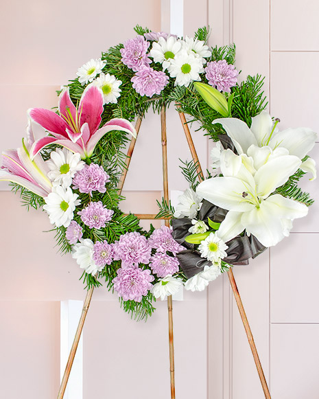 Funeral wreath with lilies and chrysanthemums