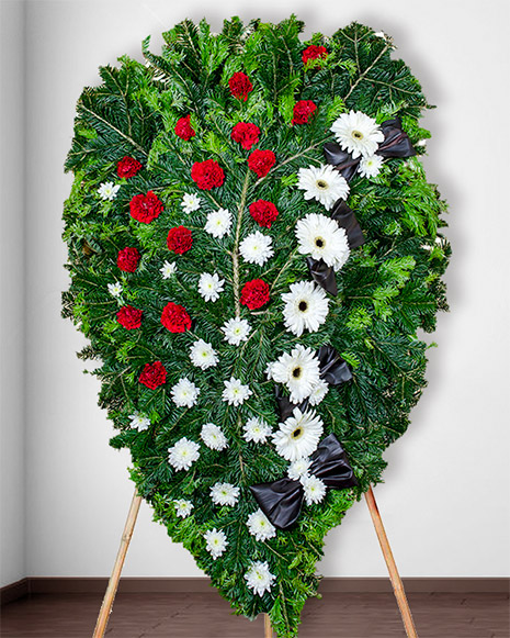 Funeral wreath with carnations, gerbera and chrysanthemums