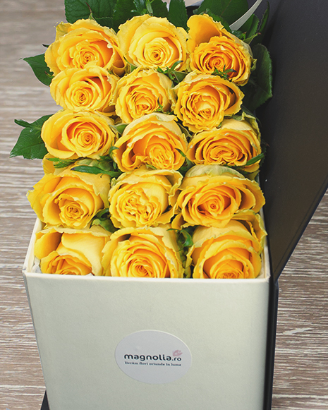 Box with yellow roses