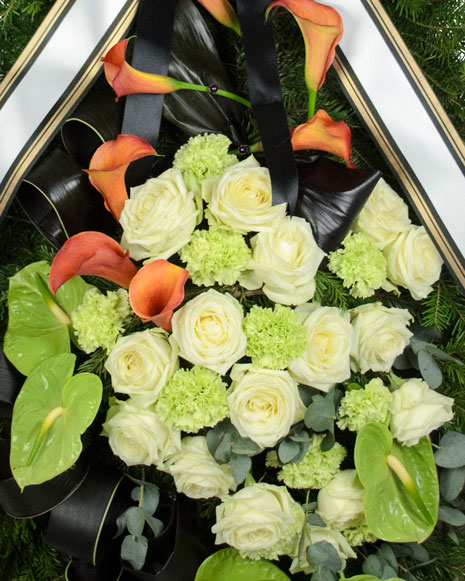 Funeral wreath with callas and roses