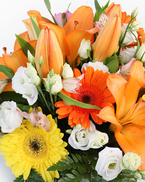 Basket with lilies and gerberas