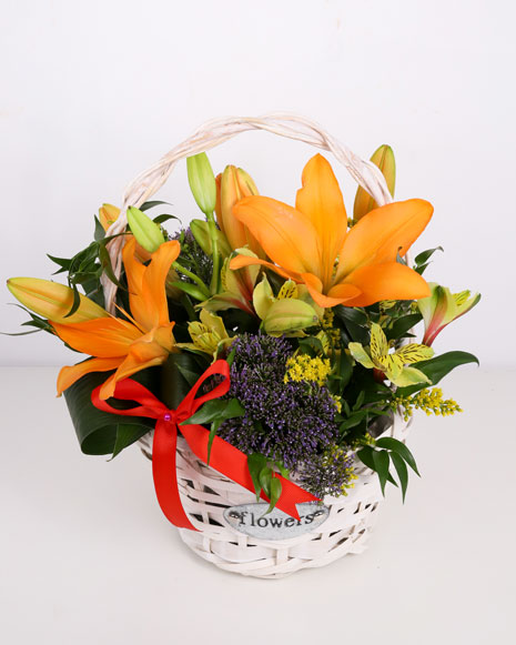 Basket with orange lilies