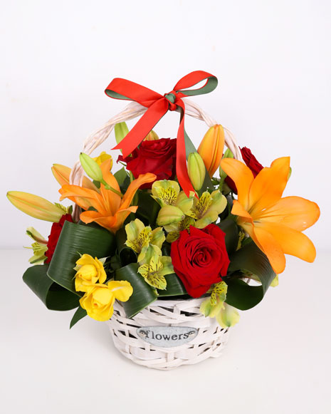 Basket with roses and lilies