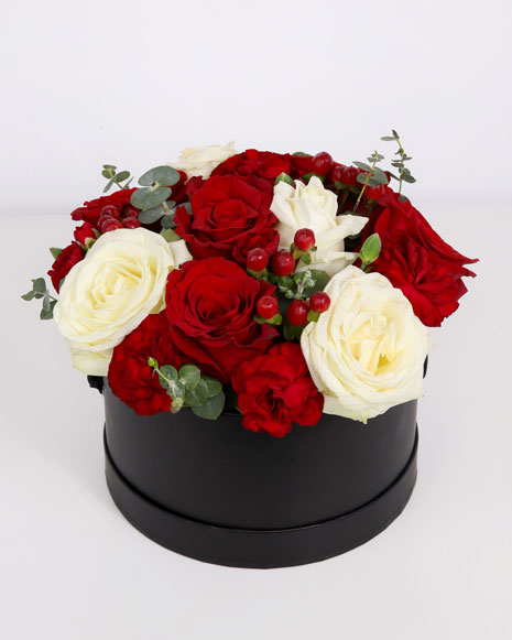 Arrangement with red and white flowers
