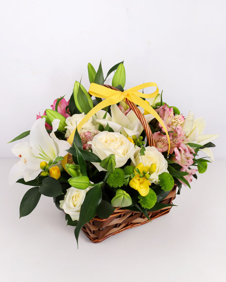 Basket with white lilies