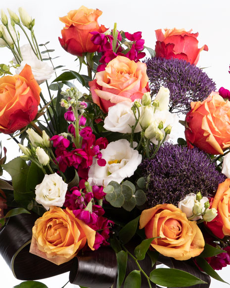 Bouquet with orange roses and eustoma