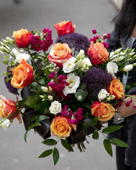 Bouquet with orange roses and eustoma