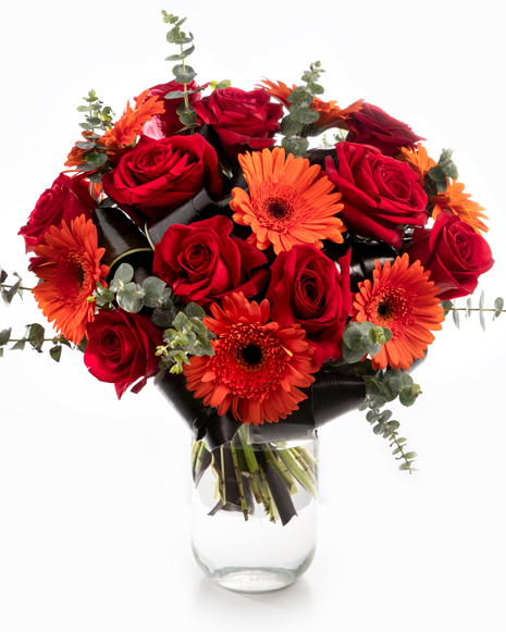 Bouquet with red roses and orange gerberas