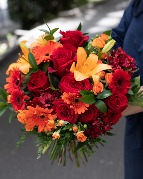 Bouquet with red and orange flowers