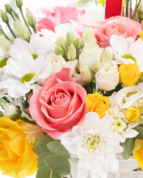 Basket with chrysanthemums and roses