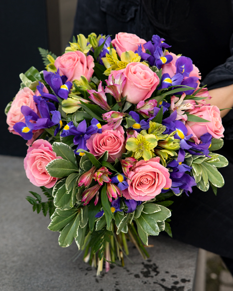 Bouquet of pink roses and irises