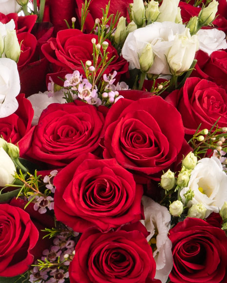 Bouquet with red roses and eustoma