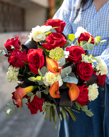 Bouquet with red roses,calla lilies and carnation