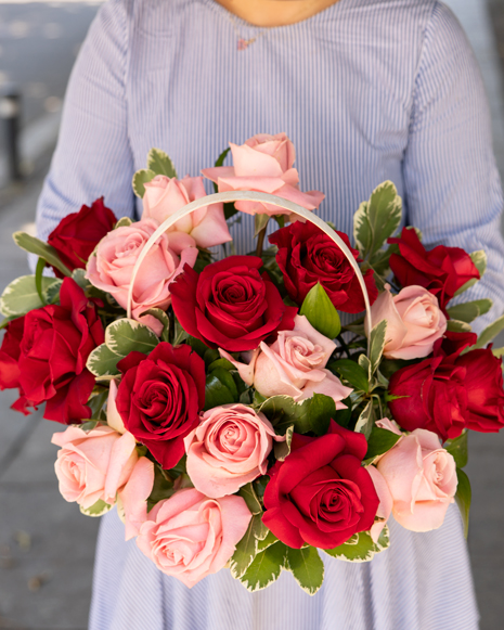 Red and pink roses basket