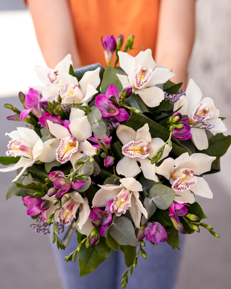 Bouquet with cymbidium orchids and freesias