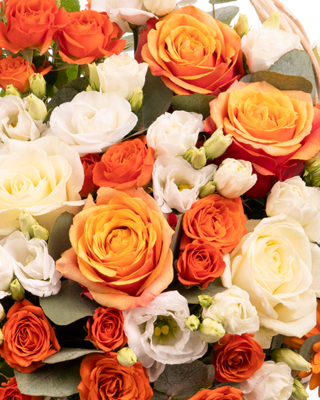 Basket of white and orange flowers