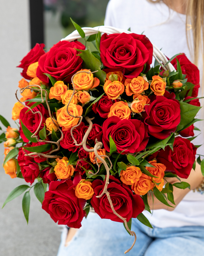 Basket with colored roses