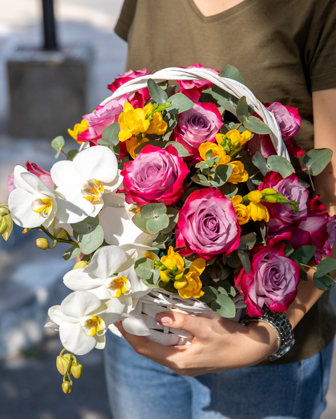 Orchid and roses arrangement