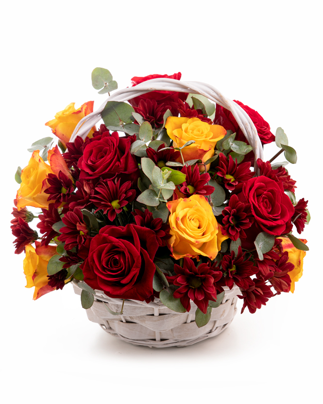Basket with chrysanthemums and roses