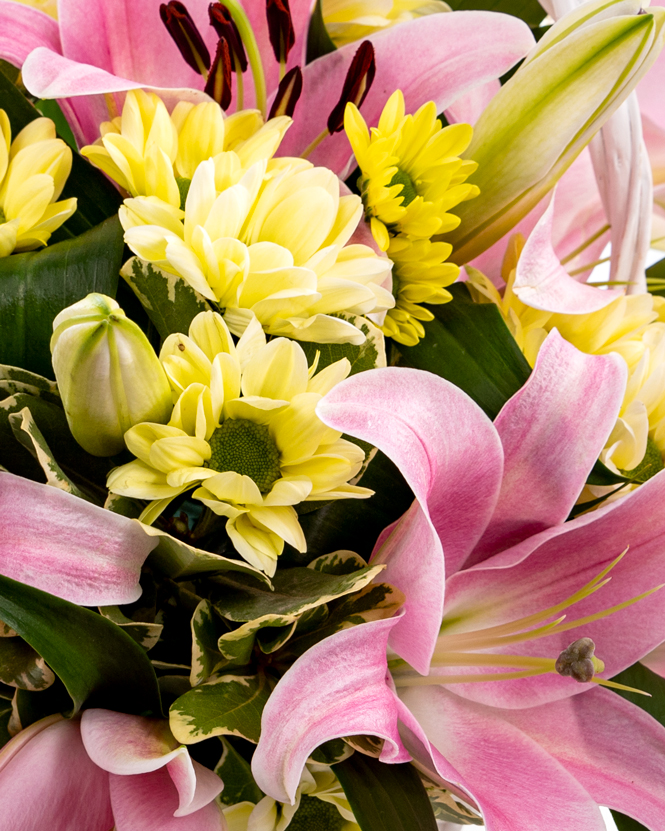 Basket arrangement with lilies