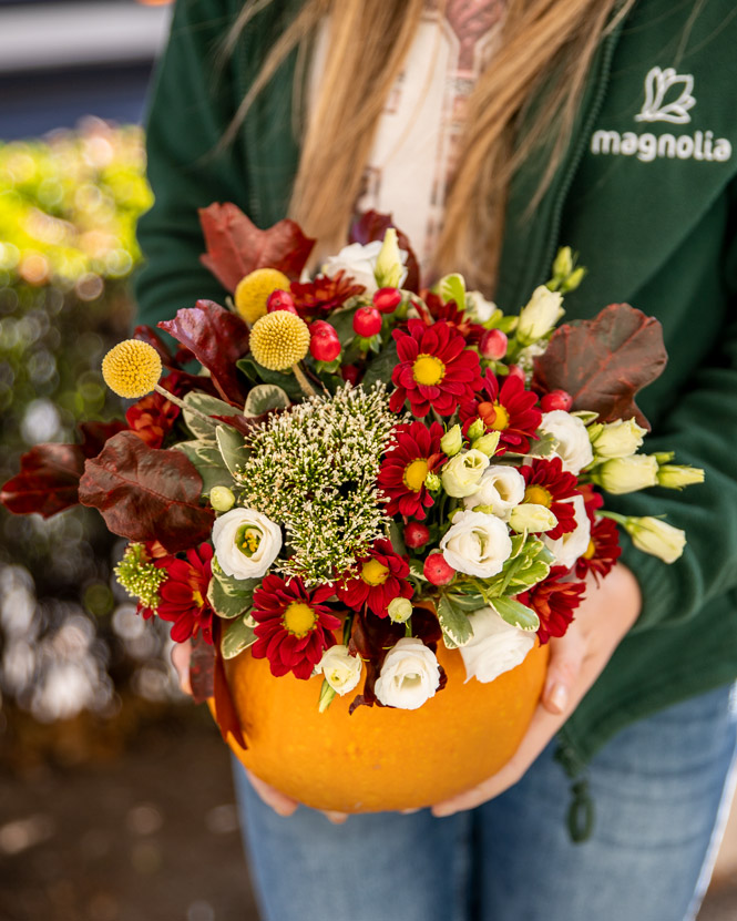 Arrangement with mix flowers in a pumpkin
