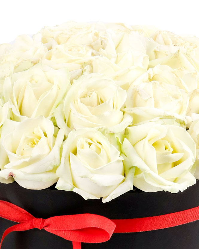 Box with white roses